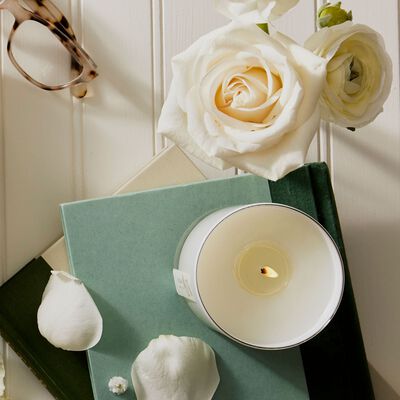 Thymes Goldleaf Candle Lit, with flower